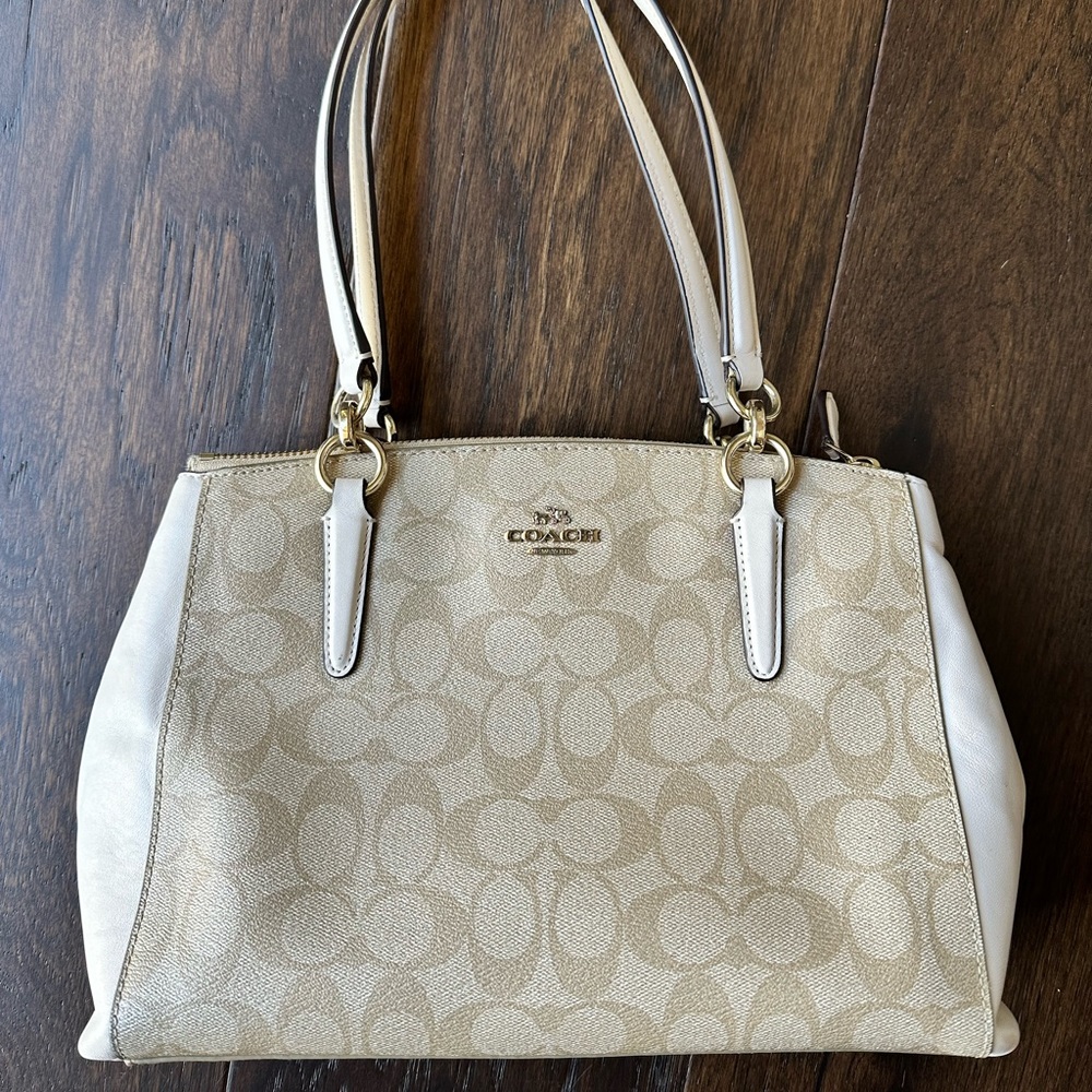 Coach shoulder bag in a creamy cream white with coach signature print